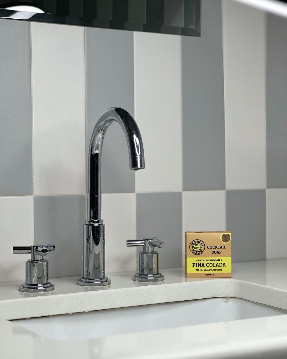 SipnSuds Pina Colada Soap on sink countertop