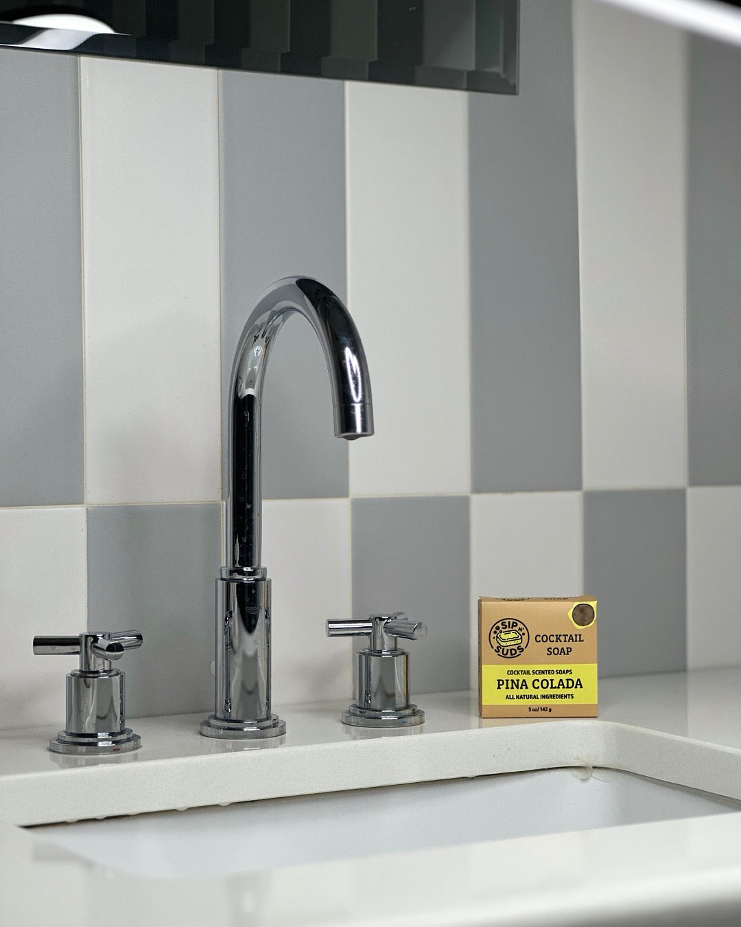 SipnSuds Pina Colada Soap on sink countertop